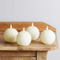 Lights4fun, Inc. Sada 4 svíček TruGlow Ivory Distressed Wax Sphere LED bez plamene na baterie s dálkovým ovládáním